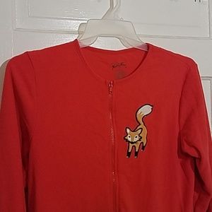 Nick & Nora Orange Pajama Onesie with Fox design on feet and chest.